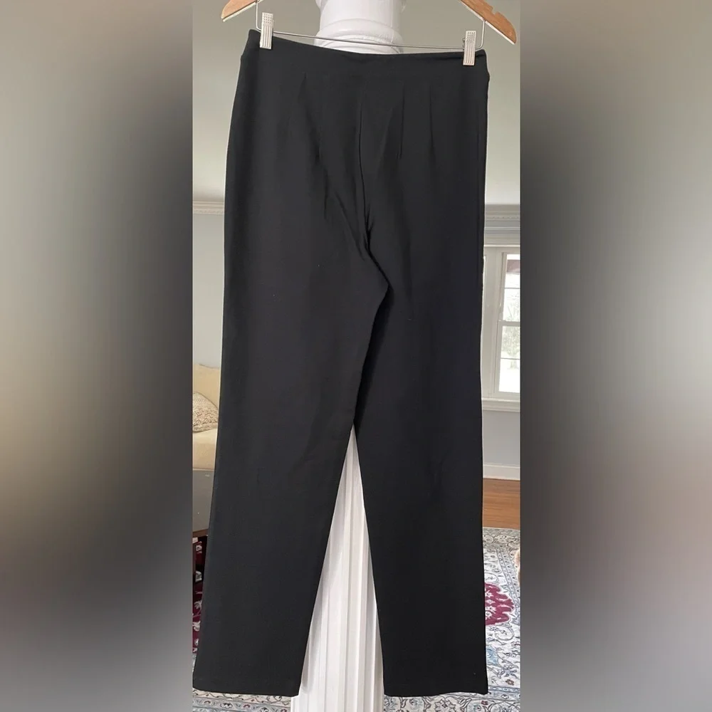 Joan Rivers women’s full length poll- on black pants size small, 66% Rayon.